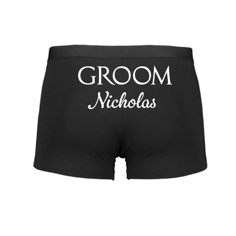 Black boxer briefs with 'Groom Nicholas' text on a white background