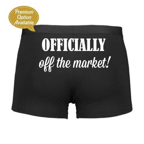 Black boxer briefs with 'OFFICIALLY off the market!' text on a white background