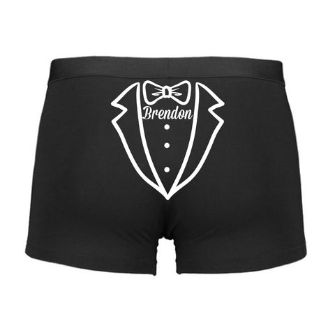 Black boxer briefs with a white tuxedo graphic and 'Brendon' text on a white background